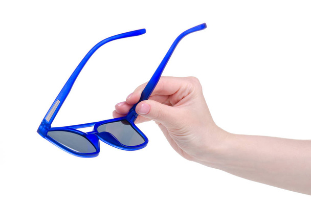 Blue sunglasses in hand - Zdjęcie, obraz
