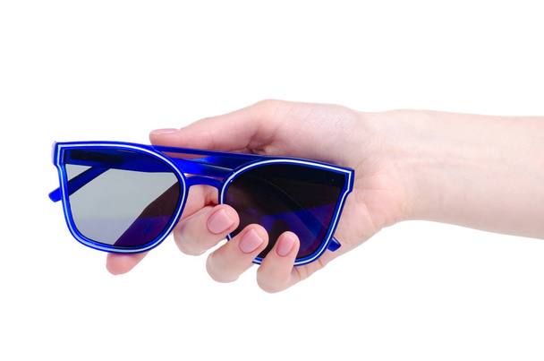 Blue sunglasses in hand - Zdjęcie, obraz
