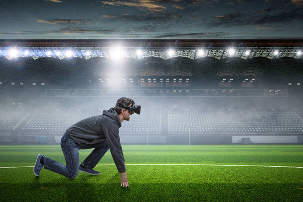 Young man in virtual reality. Mixed media - Foto, Imagen