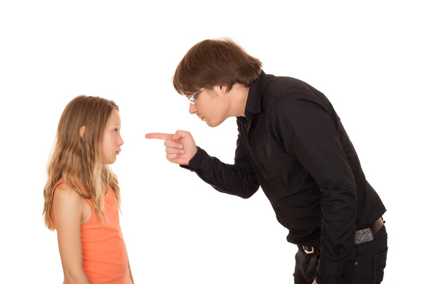 Angry father pointing finger at his child - Photo, Image