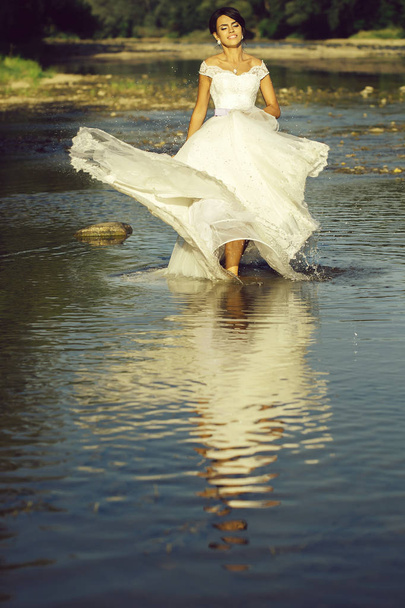 pretty bride in water - Fotó, kép