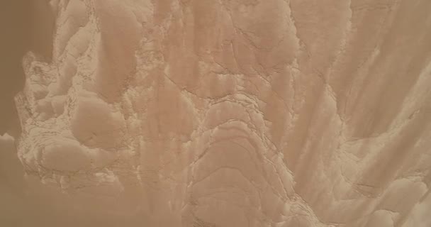 Aerial drone scene of texture of sand dune. Camera ascending discovering limit of dune with valley. Abra pampa, Jujuy, Argentina. Huancar - Záběry, video