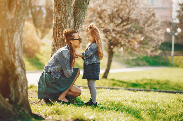 stylish mother with daughter - 写真・画像