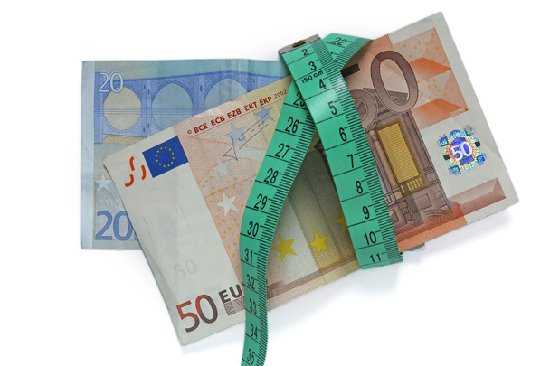 euro bankovky a měr páska - Fotografie, Obrázek