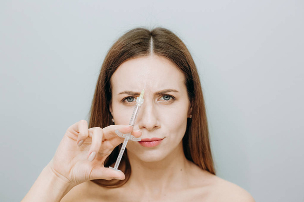 Cosmétologie d'injection belle peau lèvres seringue rajeunissement
 - Photo, image