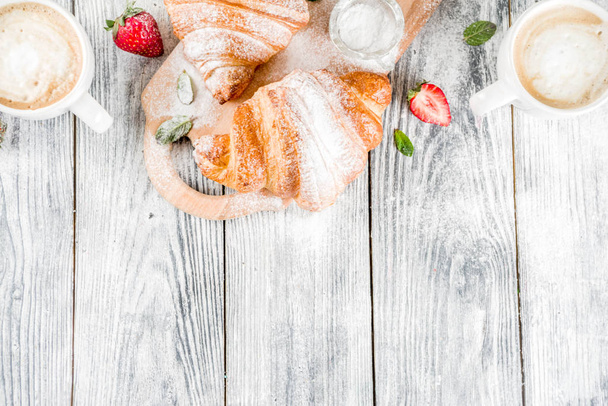 Breakfast concept with coffee and croissants - Photo, image