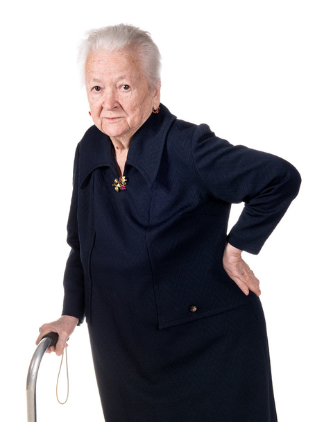 Old woman holding her lower back - Foto, immagini