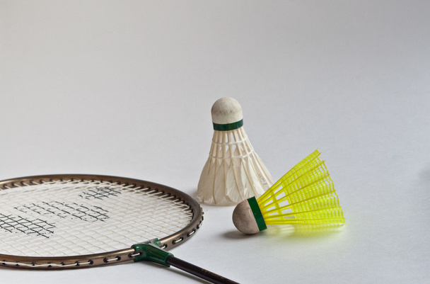 Badminton racket, shuttlecock on a white background. - Foto, Imagen