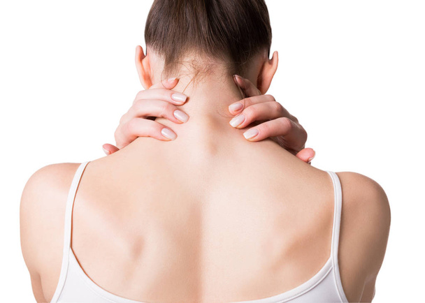Muscle spasm, neck, trapezoid and shoulders pain. Female back in white top. Woman put her fingers on sore spots, isolated on white. - Foto, Imagen