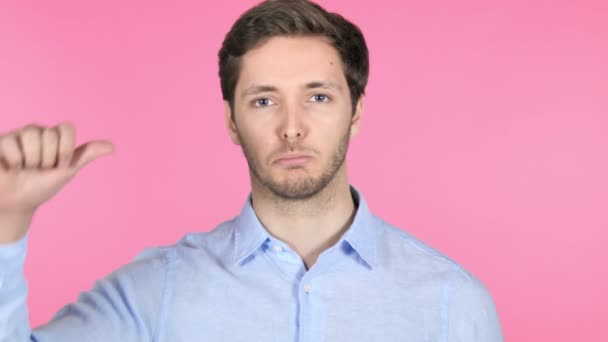 Thumbs Up by Young Man on Pink Background - Filmagem, Vídeo