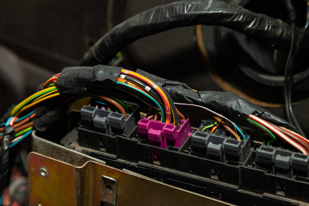 Large wide cable with multicolored red and green wires and conne - 写真・画像