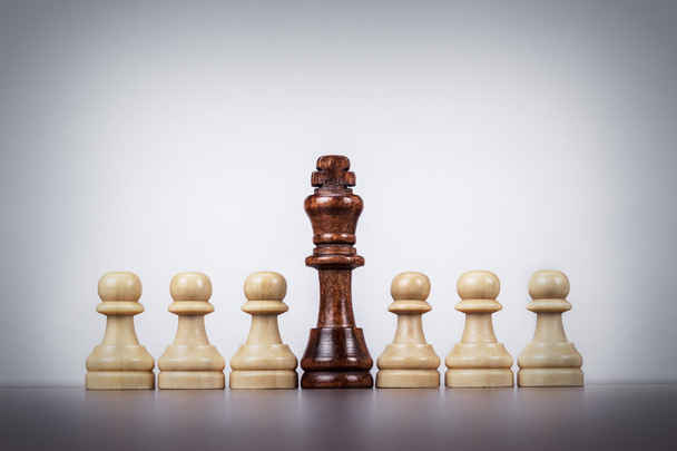 Chess king leadership concept over grey background - Foto, Bild