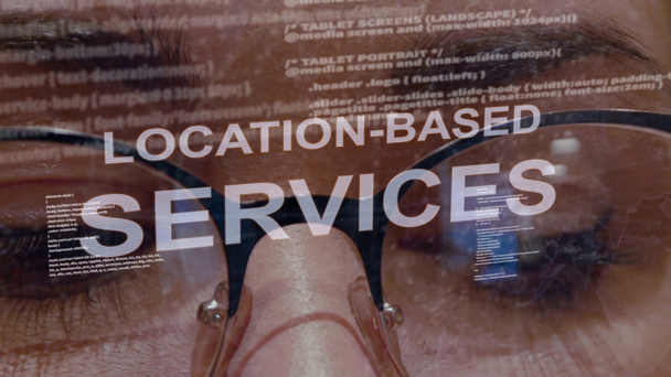 Location-based services text on background of female developer - Footage, Video