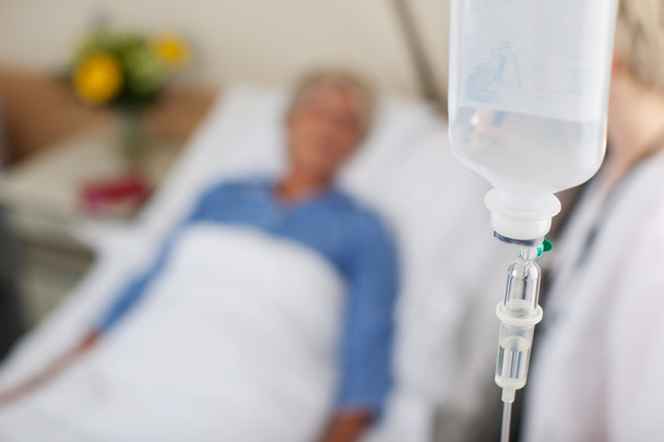 Infusion Bottle With Patient And Doctor In Hospital - Foto, Bild
