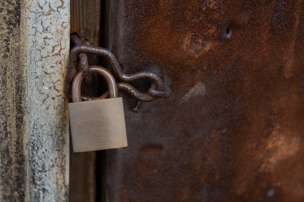 Closeup wooden door with lock  - Φωτογραφία, εικόνα
