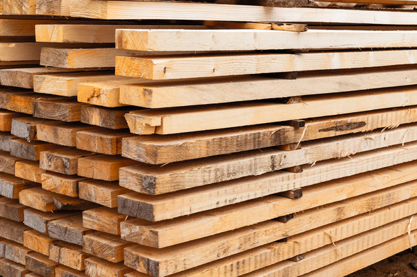 stack boards warehouse of building materials high stack end background natural material - Photo, Image