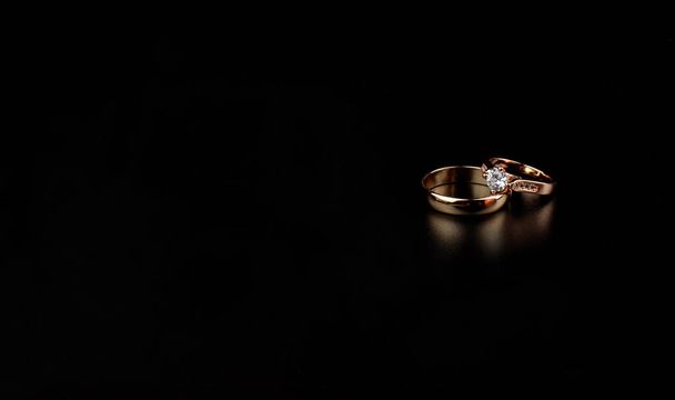 gold wedding rings with a diamond  - Fotó, kép