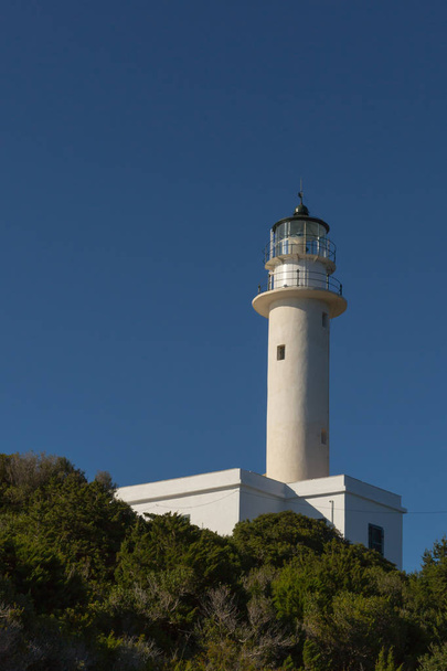 white lighthouse with blue sky in Lefkada, Greece - Zdjęcie, obraz