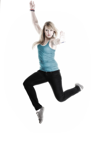 Young female Happy woman jumping with arms up isolated - Фото, изображение