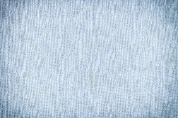 Thick blue paper with embossing. Blank background for layout with vignette. - Foto, afbeelding