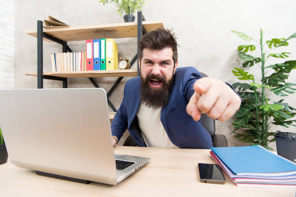 Business confrontation. Bad news. Failed again. Mission failed. It is your fault. So cruel. Brutal businessman in office. Mature man with beard. bearded hipster use computer. Male boss working - Foto, afbeelding