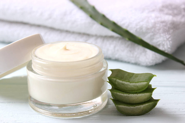 cream with aloe vera on a light background. Aloe vera skin care. Moisturizing and skin care. - Photo, Image