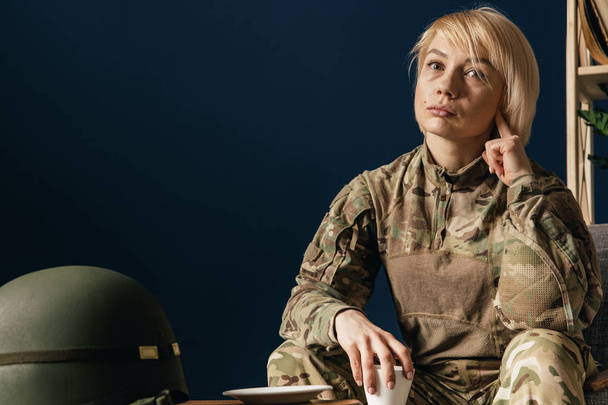 Portrait of young female soldier - Photo, Image
