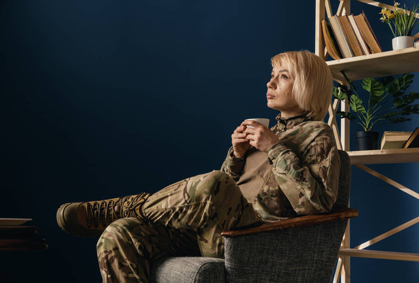 Portrait of young female soldier - Фото, изображение