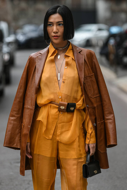Milan, Italy - February 23, 2019: Street style outfit- models, bloggers and influencers before a fashion show during Milan Fashion Week - MFWFW19  - Foto, Imagen