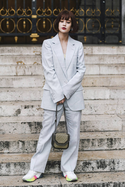 Paris, France - March 04, 2019: Street style appearance during Paris Fashion Week - PFWFW19 - 写真・画像