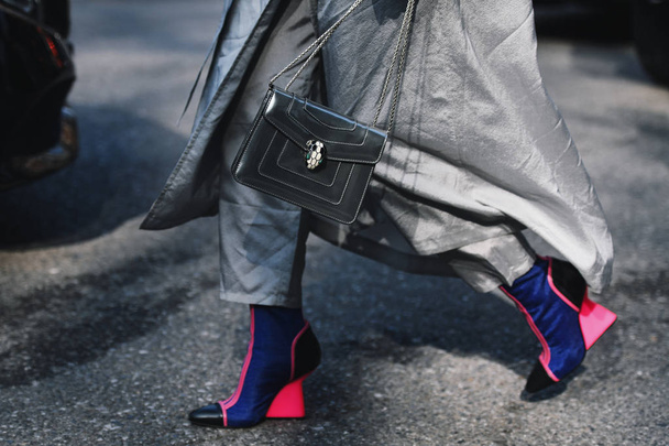 Milan, Italy - February 21, 2019: Street style Boots detail after a fashion show during Milan Fashion Week - MFWFW19 - 写真・画像