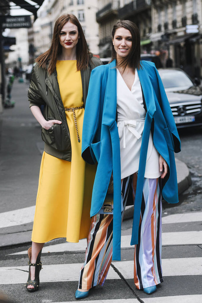 Paris, France - March 02, 2019: Street style outfit Landiana Cerciu, Julie Ianc after a fashion show during Paris Fashion Week - PFWFW19 - Фото, изображение