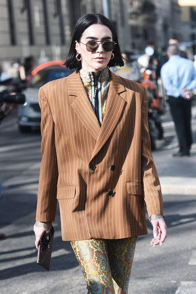Milan, Italy - February 22, 2019: Street style outfit - models, bloggers and influencers before a fashion show during Milan Fashion Week - MFWFW19 - Fotoğraf, Görsel