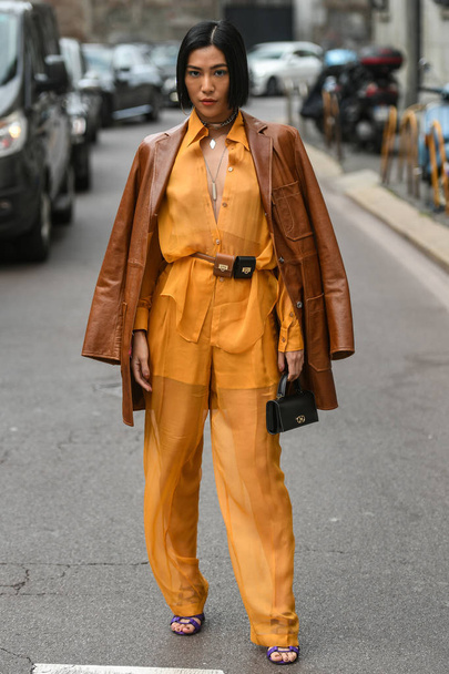 Milan, Italy - February 23, 2019: Street style outfit- models, bloggers and influencers before a fashion show during Milan Fashion Week - MFWFW19  - Fotó, kép