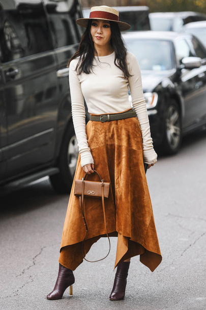 Milan, Italy - February 23, 2019: Street style Outfit after a fashion show during Milan Fashion Week - MFWFW19 - Foto, Imagen