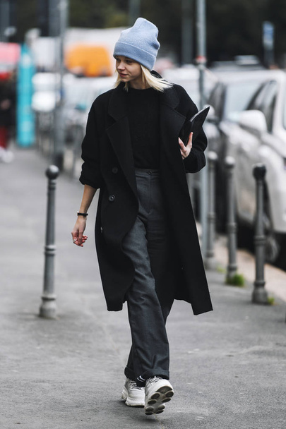 Milan, Italy - February 23, 2019: Street style Outfit after a fashion show during Milan Fashion Week - MFWFW19 - 写真・画像