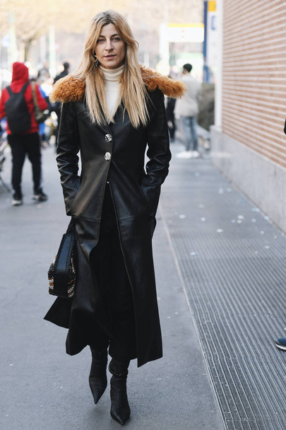 Milan, Italy - February 21, 2019: Street style Outfit before a fashion show during Milan Fashion Week - MFWFW19 - 写真・画像