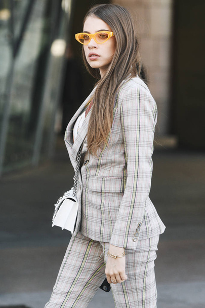 Milan, Italy - February 24, 2019: Street style outfit before a fashion show during Milan Fashion Week - MFWFW19 - 写真・画像