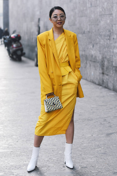 Milan, Italy - February 21, 2019: Street style Influencer Yuwei Zhangzou after a fashion show during Milan Fashion Week - MFWFW19 - 写真・画像