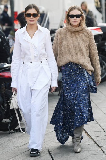 Milan, Italy - February 22, 2019: Street style outfit - models, bloggers and influencers before a fashion show during Milan Fashion Week - MFWFW19 - Фото, изображение