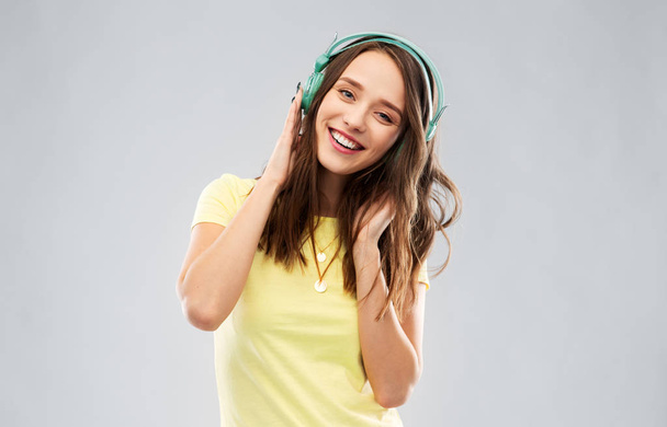 happy young woman or teenage girl with headphones - Photo, Image