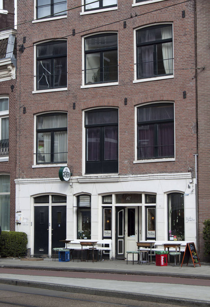 View of traditional architecture of Amsterdam at daytime - Photo, Image
