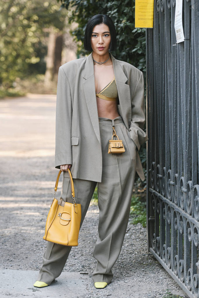 Milan, Italy - February 22, 2019: Street style Outfit after a fashion show during Milan Fashion Week - MFWFW19 - Zdjęcie, obraz