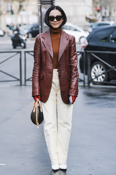 Paris, France - March 05, 2019: Street style outfit Yoyo Cao after a fashion show during Paris Fashion Week - PFWFW19 - Foto, afbeelding