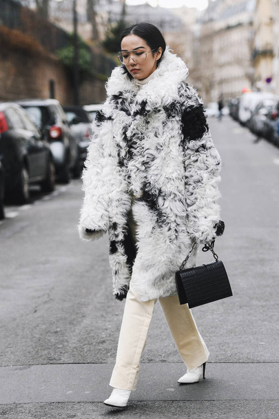 Paris, France - March 02, 2019: Street style outfit -  Yoyo Cao after a fashion show during Paris Fashion Week - PFWFW19 - Fotó, kép
