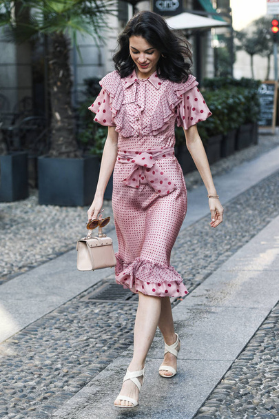 Milan, Italy - February 21, 2019: Street style outfit after a fashion show during Milan Fashion Week - MFWFW19 - Фото, изображение