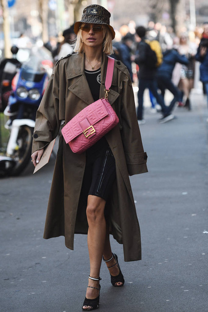 Milan, Italy - February 21, 2019: Street style Woman wearing Fendi before a fashion show during Milan Fashion Week - MFWFW19 - 写真・画像
