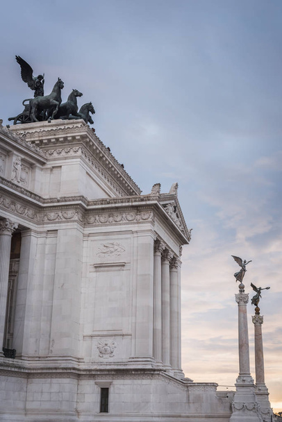Columns and statues at the entrance of the Vittorio Emanuele II monument in Rome - Photo, Image