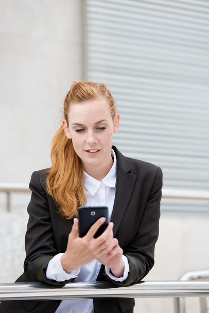 Attractive Woman Looking At Smartphone - Photo, Image