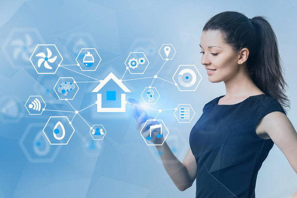 Smiling woman with phone, smart home interface - Foto, Bild